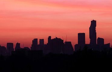 Fototapeta na wymiar Bangkok city at sunrise, Mahanakorn tower, Silom area, Thailand