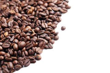 Roasted coffee beans on a white background