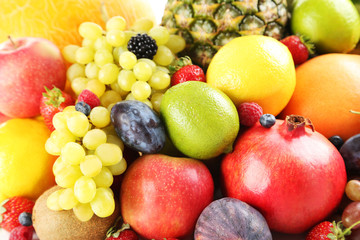 Fototapeta na wymiar Ripe and tasty fruits background