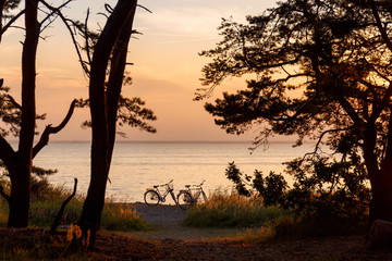 Two bicycles by the beach on a Swedish summer night
