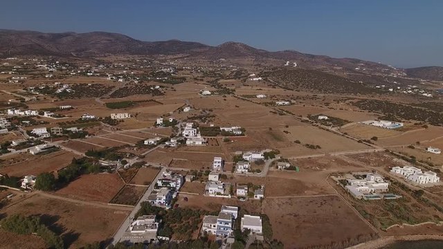Greek island of Paros. Coast and landscape with scattered houses.