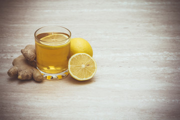 Cup of  kombucha with lemon and ginger. Copyspace