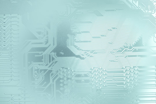silhouette of a computer motherboard, on a light blue faded background. suitable as a background for your IT technology presentation