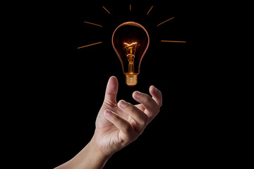 Hand with incandescent bulbs