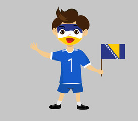 Fan of Bosnia and Herzegovina national football team, sports. Boy with flag in the colors of the national command with sports paraphernalia.