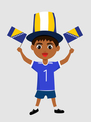 Fan of Bosnia and Herzegovina national football team, sports. Boy with flag in the colors of the national command with sports paraphernalia.