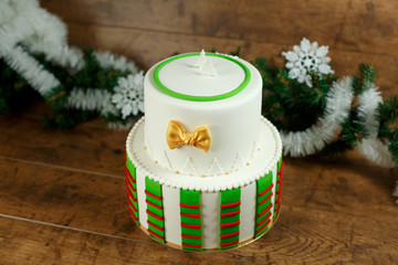 beautiful Christmas green cake on a wooden background
