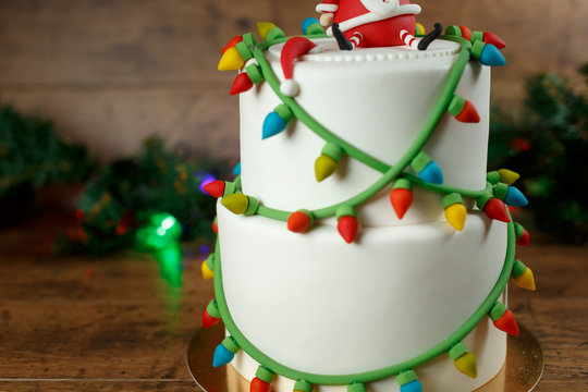 Beautiful Christmas Green Cake On A Wooden Background
