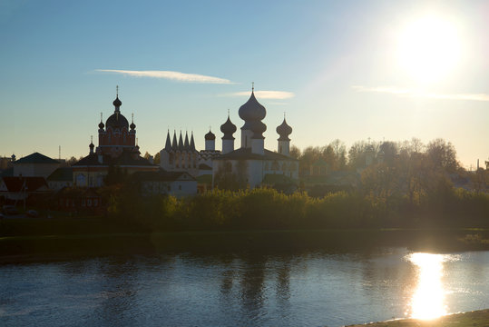 View of the Tikhvin Deiparous Uspensky monastery from the river Tikhvinki at sunset. Tikhvin, Russia