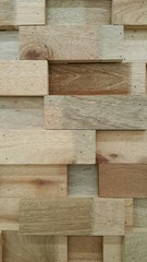 Wooden block wall, vertical orientation.