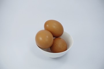 fresh eggs on white background