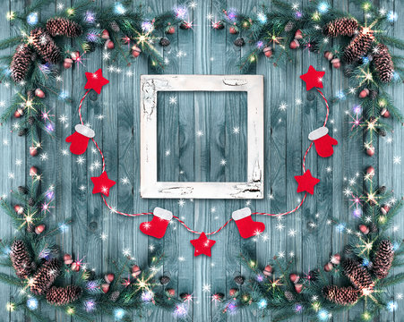 Christmas background with photo frame, illumination, glowing sta