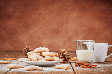 Christmas background with vanilla cookies and milk