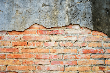 Orange brick wall cracked cement Old , vintage brick background