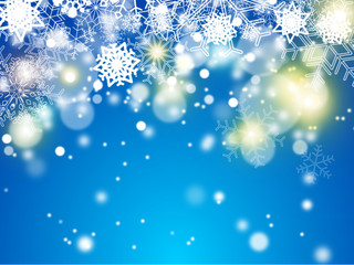 fond de noël bleu avec contour complet en flocons et effet de bokeh sur demi hauteur