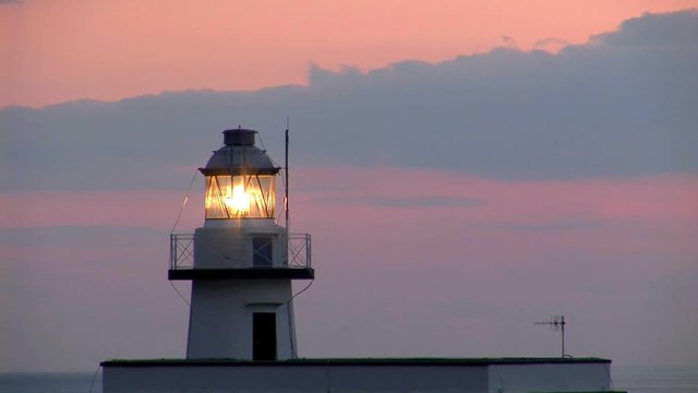 Faro al tramonto