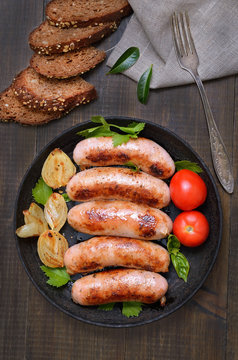 Barbecue sausages in frying pan