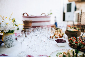 National traditional buffet table with alcohol and snacks at the wedding celebration