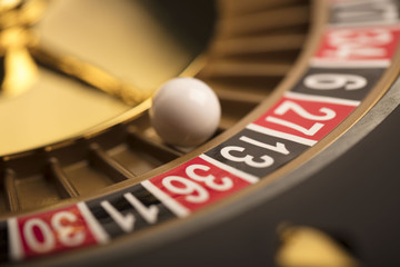 Obraz premium Casino theme. Golden roulette wheel closeup.