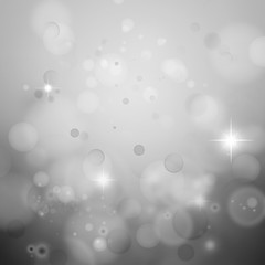 Abstract grey silver bokeh light blurs Christmas New Year background