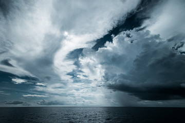 Dark clouds in open ocean