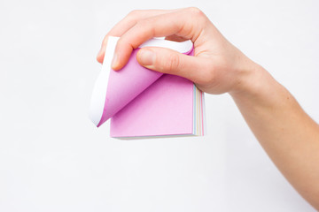 White sheet of paper in woman hands. Advertising