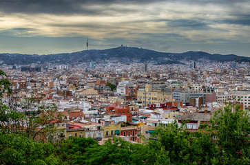 Evening view on Barcelona city and Montserrat mountain, Spain