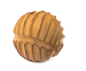 Carved decorative ball of juniper.