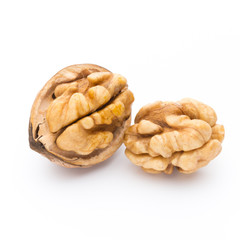 Walnut and walnut kernel isolated on the white background.