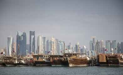 Traditiona dhow in front of Doha city scape