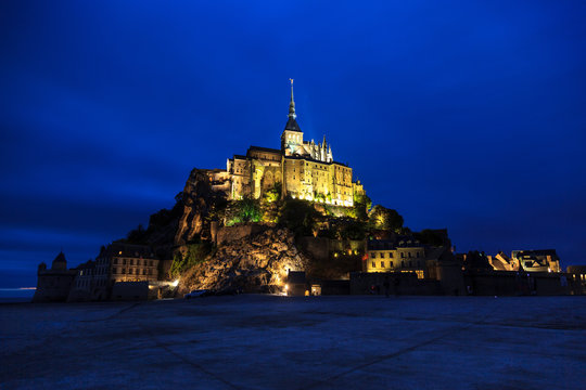 Night view of the abbey of mont saint michel.