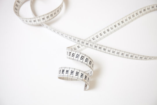 Measure tape and white background