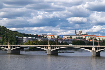 Dramatic sky, Autumn panorama with Vltava River and Prague Castle, Central Europe, Czech Republic