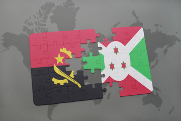 puzzle with the national flag of angola and burundi on a world map.
