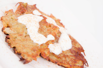 Potato Pancakes with cream and brown sugar