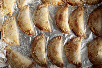 Pumpkin pies made by hand.
