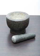 Granite mortar standing on kitchen table