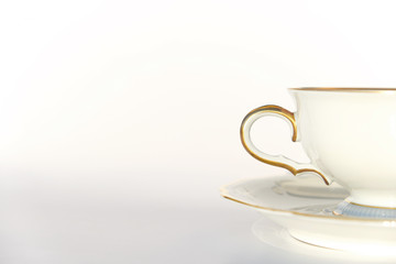 beautiful porcelain tea cup and saucer