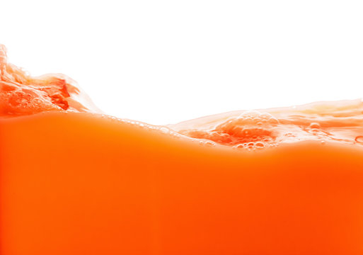 Tomato juice splash isolated on white background