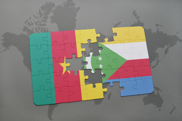 puzzle with the national flag of cameroon and comoros on a world map.