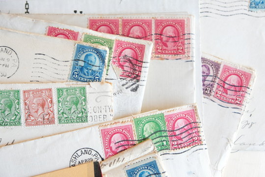 many old letters, envelopes,  postal stamps