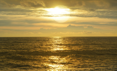 Golden Sky and sea in sunset at Bangniang Beach ,Khao Lak, Phang Nga Province,Thailand