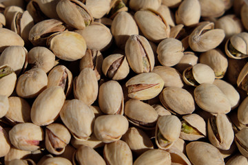 pile of pistachio nuts - pistachios background
