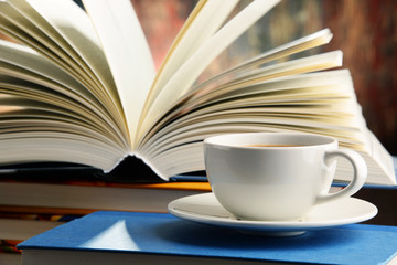 Composition with books and cup of coffee