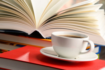 Composition with books and cup of coffee