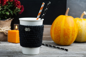 Candles, mug, pumpkin and autumn home decor