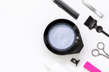 Tools for hair dye and hairdye top view white background