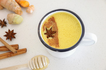 Turmeric latte, Golden milk, Turmeric milk made from turmeric, almond mink, cinnamon, ginger and honey, healthy hipster drink