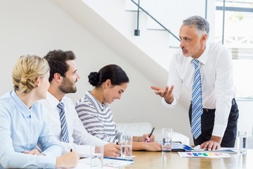 Business colleagues discussing in a meeting