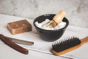 Wooden desktop with tools for shaving beards